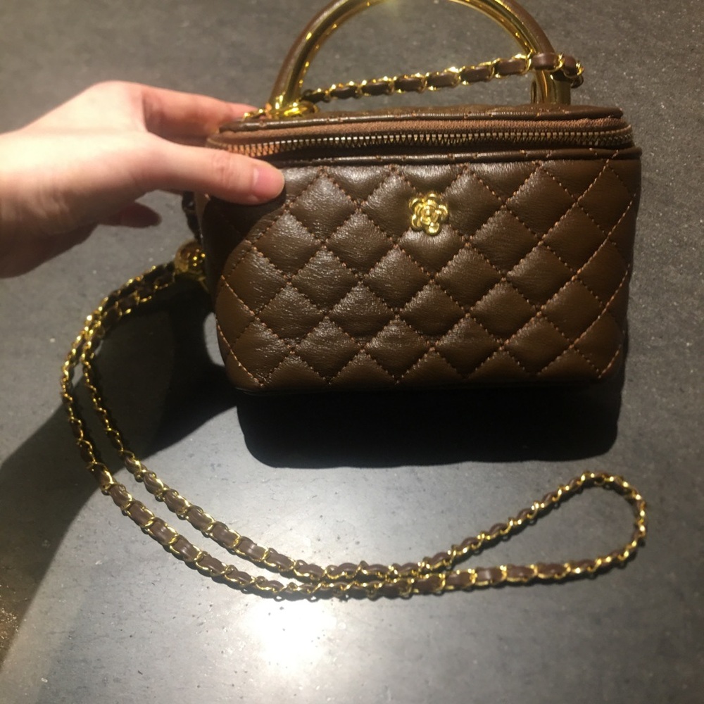 Brown Quilted Handbag with Gold Accents